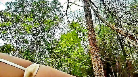 Indian beauty in white thong outdoors, teasing in forest