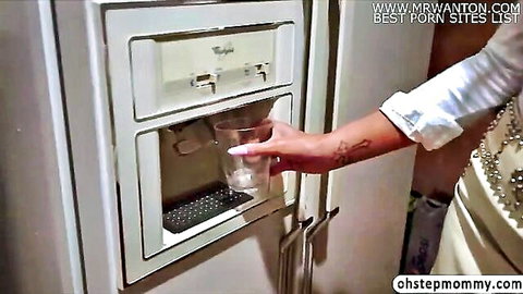 Ebony tattooed stepmom in white blouse at fridge seduction