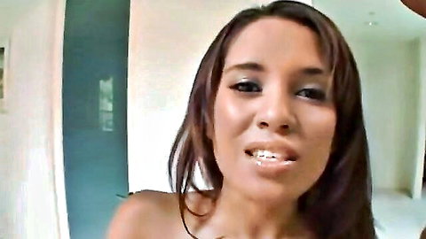 Hot Latina Renae Cruz topless, smiling seductively in solo tease