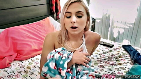 Blonde stepdaughter teases nipples in white tank top POV