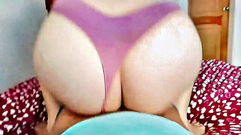 Thick curvy woman in purple thong bending over with big ass exposed
