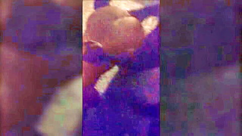 Blurry closeup of pale white ass cheeks spread wide from behind in doggy style.