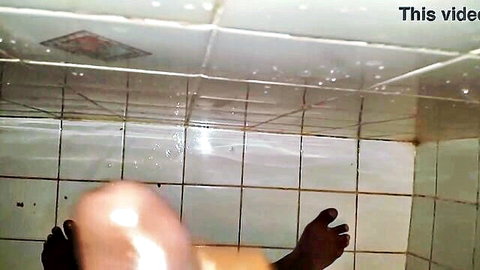 Steamy shower cumshot facial on unknown model in tiled bathroom