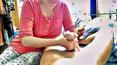 Stepsister giving handjob to stepbrother on bed until cumshot