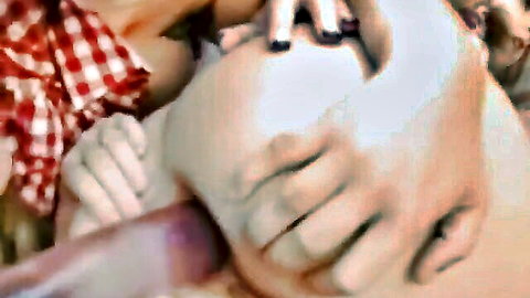 Hands spreading pale ass cheeks inserting thick purple dildo into tight anus on red checkered picnic blanket