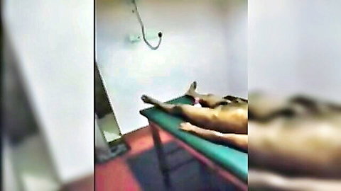 Sri Lankan woman nude on massage table in spa scene