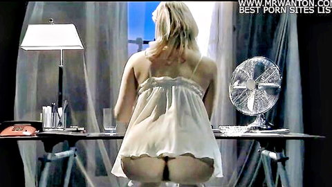 Blonde woman in sheer white nightgown exposing bare ass from behind
