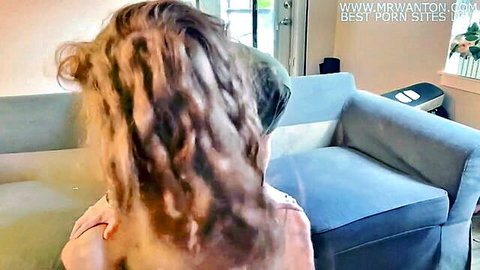 Redhead amateur shows thick ass from behind on living room couch