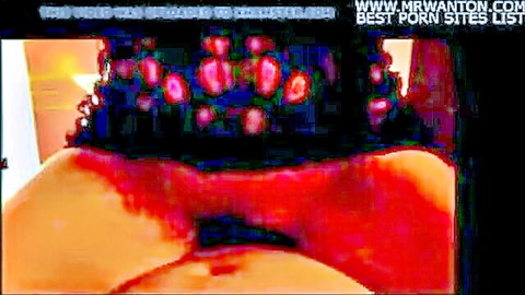 Juicy woman's ass in black fishnets teased closeup under steamy red lighting