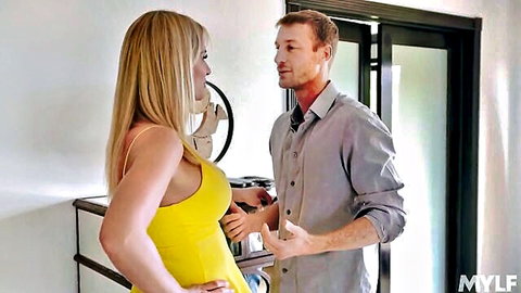 Rachael Cavalli in tight yellow dress talking to man in Mylf MILF scene