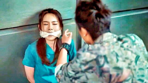 Bound Asian nurse gagged in intense BDSM JAV scene