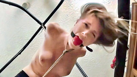 Ashley Lane nude in BDSM suspension with ball gag and ropes