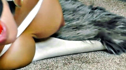 MILF's bare ass and thighs exposed on shaggy gray fur rug with white panties aside