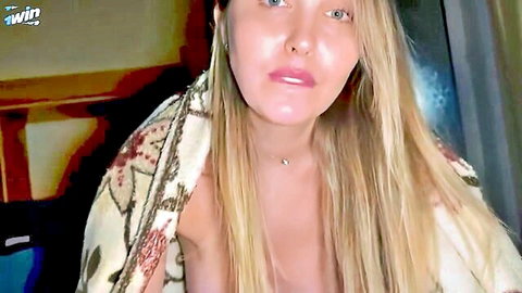 Blonde with big tits exposes bare breasts teasing in open robe POV