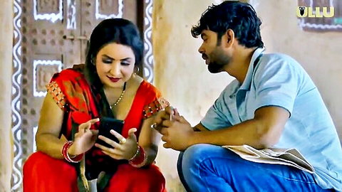 Indian MILF in red saree flirting with man on phone in Ullu Malai 1 series