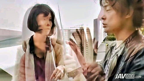 Megumi Shino in outdoor JAV couple scene with umbrella, 18+