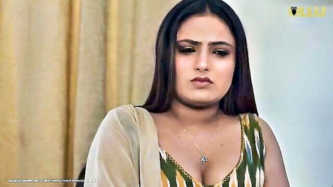 Indian woman in sheer dupatta with deep cleavage in Ullu hot web series