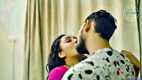 Passionate Indian couple kissing intimately in web series scene