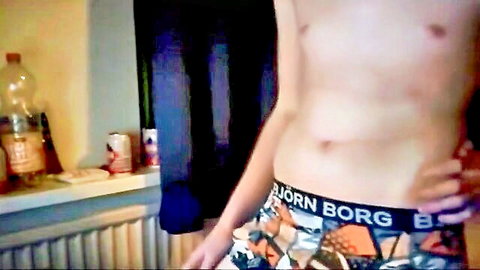 Sexy gay twink posing shirtless in colorful Bjorn Borg underwear
