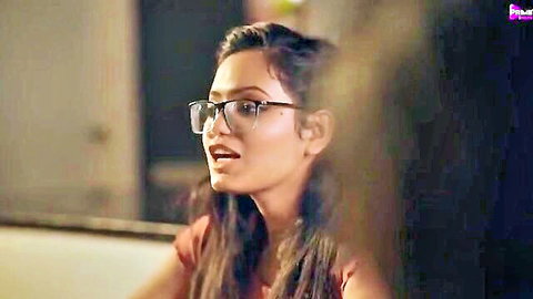 Indian woman with glasses in seducing pose from Harami 2023 Ep3 Primeshots web series