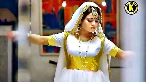 Indian woman in white gold traditional dance attire from hot Hindi web series