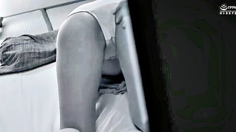 Japanese babe with big pale ass bends over bed white panties pulled aside exposing buttocks