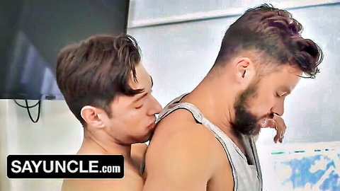 Beaux Matthews and Archie Paige in intimate gay embrace, muscular hunks kissing neck