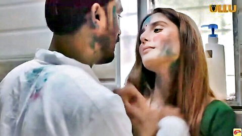 Indian couple in intimate Holi paint embrace, erotic movie scene