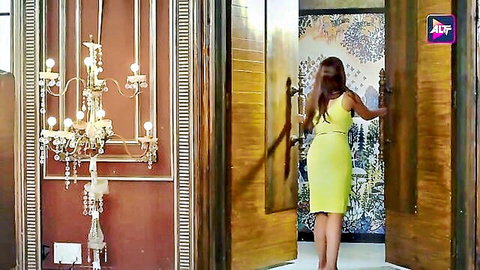 Sexy Indian woman in tight yellow dress entering room, big tits tease