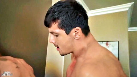 Clark Parker in intense muscular gay embrace