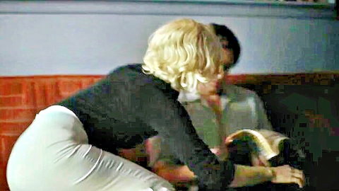 Ana de Armas in tight white pants bending over man in Blonde 2022