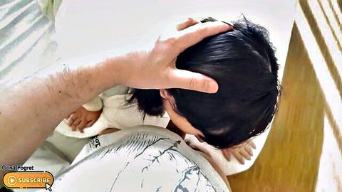 Man's hand roughly grips pigtail Japanese teen girl's head forcing it down for intense deep throat POV