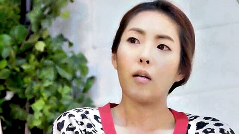Seductive Korean woman in polka dot top, short hair, from Young Sister 3 sex movie