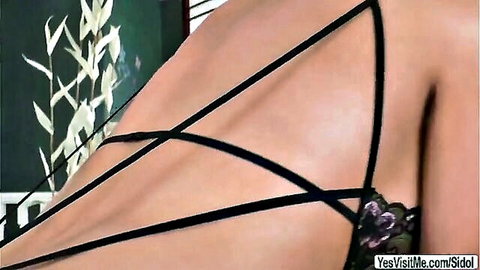 Adriana Chechik in black strappy lingerie, back view with Chanel Santini