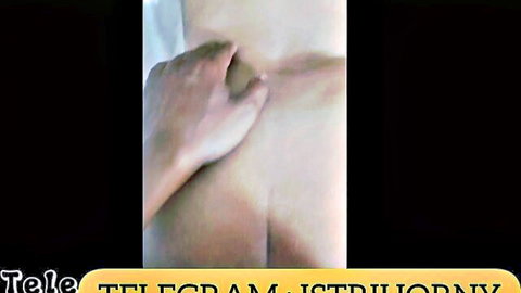 Man's hand spreading mature Indonesian woman's big bare ass cheeks in homemade video