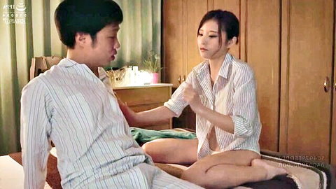 Asian JAV couple in open shirts, intimate foreplay on bed
