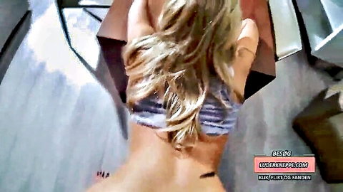Blonde Danish woman bent over in lingerie, teasing view