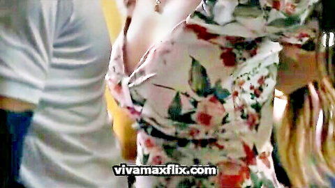 Vivamax Foursome 2023 thumbnail: Asian woman in low-cut floral dress showing cleavage, embraced by man