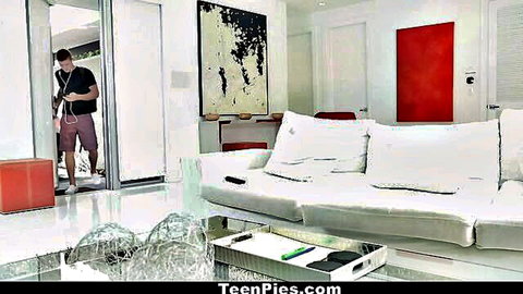 Young handsome guy in tank top and shorts peeks into luxurious modern living room from TeenPies