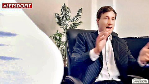 Suited boss gesturing passionately in office chair with curvy big ass nearby