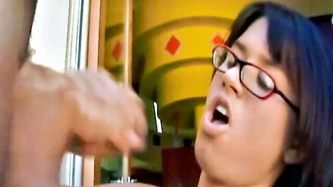 Latina with glasses giving intense handjob close-up