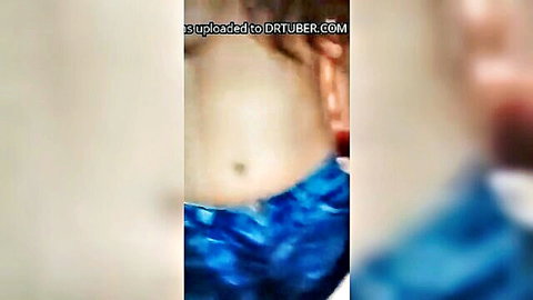 Cute Indian girl in blue outfit showing bare midriff