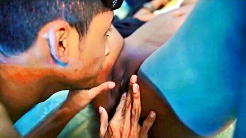 South Asian man passionately kissing and sucking sexy Indian babe's bare tits