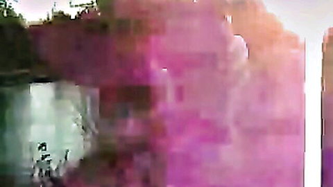 Blurry distorted purple waterfall cascading amid pixelated green foliage in nature