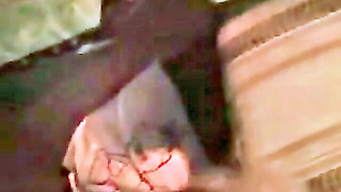 Sexy redhead Johnie with glasses in steamy adult scene