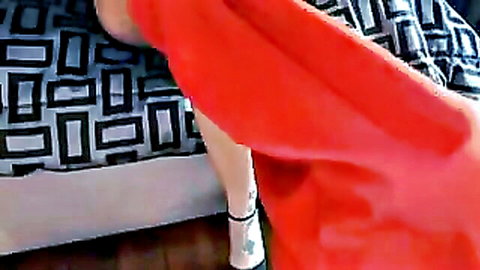 Tanned curvy babe with huge ass bent over bed in red dress and white heels teasing
