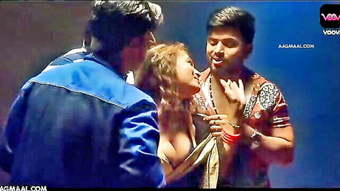 Indian MILF in steamy threesome with two men, exposed tits and intense kissing