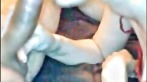 Close-up of pale-skinned woman with toy insertion in intimate area
