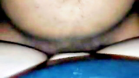 Ebony woman's hairy pussy exposed with white panties pulled aside in POV closeup