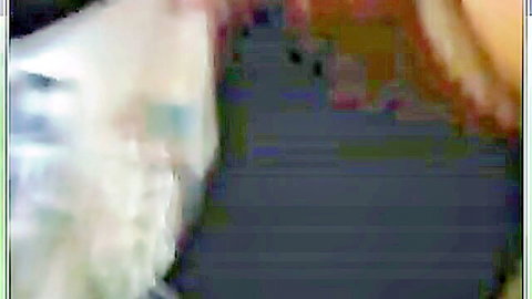 Blurry webcam closeup of mature white woman teasing with tits exposed solo